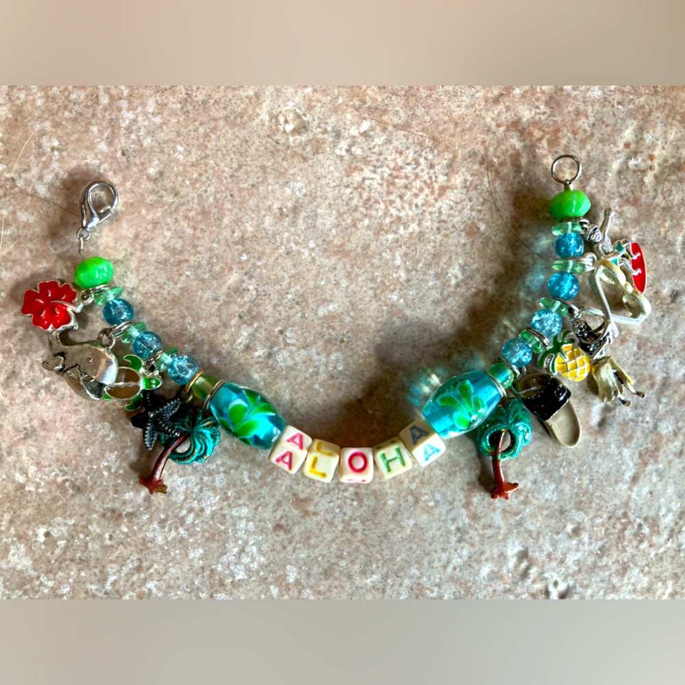 Child’s Silver Charm Bracelet with Hawaiian Theme